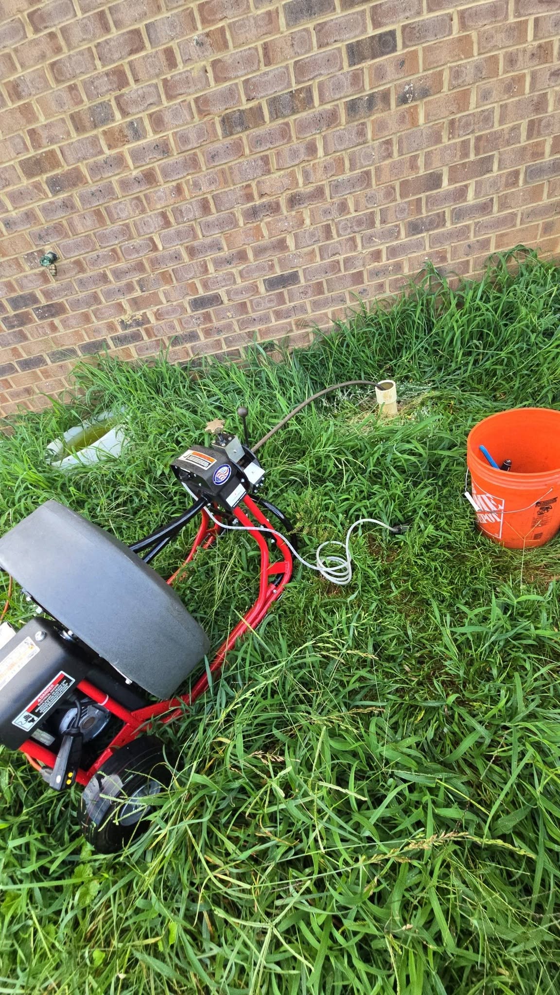 Drain cleaning with a drain machine at a home in the Charleston TN corridor